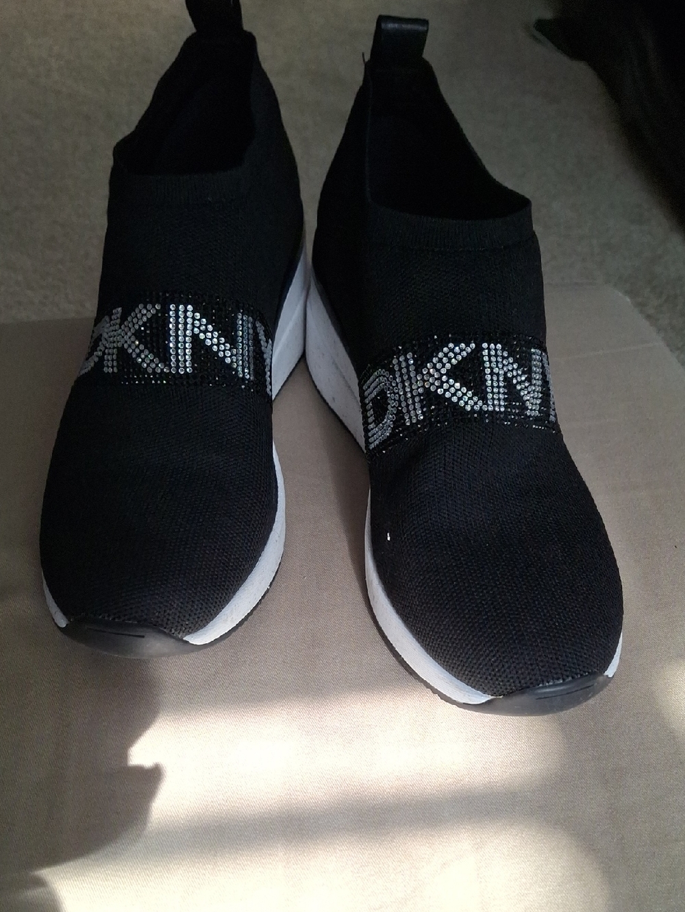 DKNY Black Slip-On Athletic Sneakers with White Soles